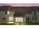 Rear view of townhome with sunroom and lawn at 818 Pryor St # 55, Mebane, NC 27302