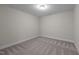 Empty bedroom with neutral wall paint and carpet at 818 Pryor St # 55, Mebane, NC 27302
