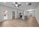 Living room with hardwood floors, sliding glass doors and view of kitchen at 818 Pryor St # 55, Mebane, NC 27302