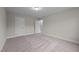 Spacious bedroom with neutral carpeting and two closets at 818 Pryor St # 55, Mebane, NC 27302