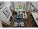 Open living area with high ceilings, a fireplace and hardwood floors at 4213 Burlington Mills Rd, Wake Forest, NC 27587