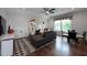 Spacious bonus room with sectional sofa and game table at 4213 Burlington Mills Rd, Wake Forest, NC 27587
