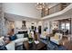 Open concept living room with kitchen and views to backyard at 4213 Burlington Mills Rd, Wake Forest, NC 27587