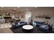 Spacious living room features comfortable sectional sofa and a modern coffee table at 2617 St Marys St, Raleigh, NC 27609