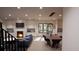 Bright dining room with hardwood floors and large windows overlooking backyard at 2617 St Marys St, Raleigh, NC 27609