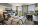 Bedroom with a plaid comforter, two nightstands, and a built-in closet at 156 Pinkie Ln, Garner, NC 27529