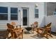 Cozy patio with fire pit and wooden chairs at 156 Pinkie Ln, Garner, NC 27529