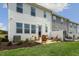 Private patio with seating area and ample yard space at 156 Pinkie Ln, Garner, NC 27529