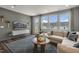 Spacious living room with sectional sofa and access to patio at 156 Pinkie Ln, Garner, NC 27529