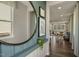 Bright and spacious entryway with large mirror and view into living area at 156 Pinkie Ln, Garner, NC 27529