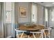Charming dining area with round table and four chairs at 156 Pinkie Ln, Garner, NC 27529