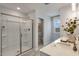Elegant bathroom with a large walk-in shower and double vanity at 156 Pinkie Ln, Garner, NC 27529