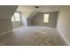 Spacious bedroom with sloped ceilings and two windows at 108 Nakoma Dr, Louisburg, NC 27549