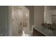Elegant bathroom with marble shower and modern vanity at 13625 Old Creedmoor Rd, Wake Forest, NC 27587
