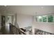 Open upper hallway overlooking the main living area at 13625 Old Creedmoor Rd, Wake Forest, NC 27587