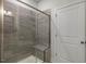 Modern bathroom with a large walk-in shower and gray tile at 2321 Sugar Cone Way, Fuquay Varina, NC 27526