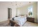 Charming bedroom with large windows and patterned wallpaper at 8916 Grand Highland Way, Wake Forest, NC 27587