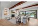 Open living room with a view of the pool and backyard at 8916 Grand Highland Way, Wake Forest, NC 27587