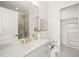 Elegant bathroom with a quartz vanity and a walk-in shower at 8916 Grand Highland Way, Wake Forest, NC 27587