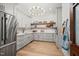 Modern kitchen featuring stainless steel appliances and light gray cabinets at 8916 Grand Highland Way, Wake Forest, NC 27587
