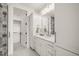 Modern bathroom with white cabinetry and walk-in shower at 8916 Grand Highland Way, Wake Forest, NC 27587
