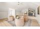 Bonus room with seating area and wet bar at 8916 Grand Highland Way, Wake Forest, NC 27587
