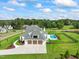 Luxury home with three-car garage, private backyard, and sparkling pool at 8916 Grand Highland Way, Wake Forest, NC 27587