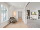 Upper hallway with access to bonus room and wet bar at 8916 Grand Highland Way, Wake Forest, NC 27587