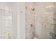 Modern shower with marble tile and glass enclosure at 8916 Grand Highland Way, Wake Forest, NC 27587