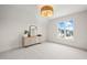 Bright bedroom with large window, plush carpeting, and a stylish dresser at 8916 Grand Highland Way, Wake Forest, NC 27587