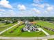 Luxury estate home with private driveway and resort-style pool at 8916 Grand Highland Way, Wake Forest, NC 27587