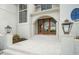 Front entrance with double doors and ornate light fixtures at 8916 Grand Highland Way, Wake Forest, NC 27587