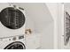 Convenient laundry room with stackable washer and dryer at 8916 Grand Highland Way, Wake Forest, NC 27587