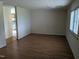 Living room with wood flooring and view of kitchen at 4511 Hopson Rd, Morrisville, NC 27560