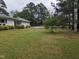 The house's front yard has a driveway and is partially landscaped at 4511 Hopson Rd, Morrisville, NC 27560