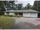 Ranch home with two-car garage and large yard at 4511 Hopson Rd, Morrisville, NC 27560