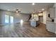 Spacious living room with hardwood floors and a ceiling fan at 103 Calluna Dr, Clayton, NC 27520