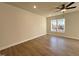 Bright bedroom with hardwood floors and a large window at 97 Calluna Dr, Clayton, NC 27520