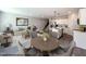 Open concept dining area and kitchen in virtually staged home at 97 Calluna Dr, Clayton, NC 27520