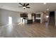 Open living room with hardwood floors and kitchen view at 97 Calluna Dr, Clayton, NC 27520