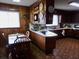 Kitchen with wood cabinets, tile floor, and breakfast nook at 3007 Old Raleigh Rd, Apex, NC 27502