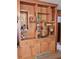 Built-in wooden shelves and cabinets with various decor at 3007 Old Raleigh Rd, Apex, NC 27502