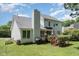 Rear view of a white house with deck and garden at 2205 Moon Water Way, Garner, NC 27529