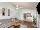 Open concept living room with view into kitchen at 2205 Moon Water Way, Garner, NC 27529