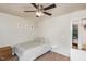 Bedroom with a full-size bed and access to a bathroom at 2205 Moon Water Way, Garner, NC 27529