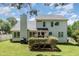 Two-story house with deck and landscaped yard at 2205 Moon Water Way, Garner, NC 27529