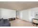 Living room features neutral carpeting and a cozy workspace at 2205 Moon Water Way, Garner, NC 27529
