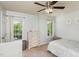 Bedroom with a double bed, dresser, and ceiling fan at 2205 Moon Water Way, Garner, NC 27529
