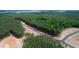 Aerial view of lakefront property with wooded lots and new roads at 410 Firefly Overlook, Pittsboro, NC 27312