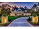 Stunning two-story farmhouse with white exterior, landscaping, and long driveway at 410 Firefly Overlook, Pittsboro, NC 27312
